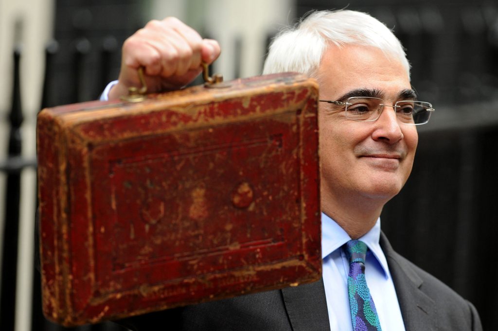 Alistair Darling standing on Downing Street.