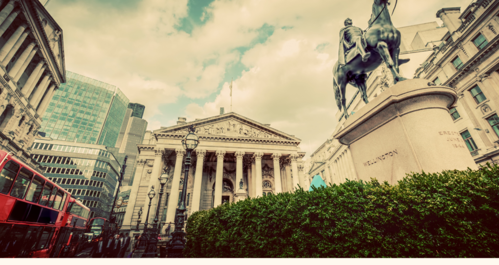 Bank of London with a red london bus going past